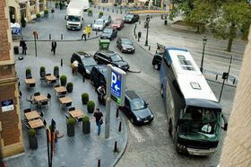 A bus decides to block two lanes of traffic on a c.jpg