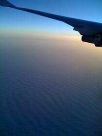Day breaks on our 747 as we approach the British I.jpg
