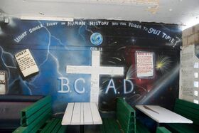 Interesting mural on the wall at Keneke s BBQ.jpg