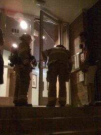 Firemen getting in the apartment.jpg