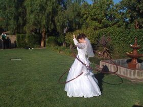 Hula hoop in a wedding dress Of course.jpg