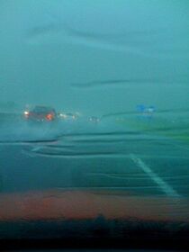 Sure is raining along 290 on the way to Houston.jpg