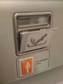 Although smoking is prohibited in the lavatories,.jpg