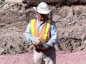 This guy working on the road on Ross St At Texas A.jpg