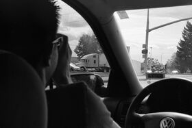 Gabe taking a picture of an truck that got itself.jpg