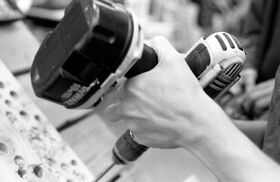 Gabe trying out a drill on display The drill decid.jpg