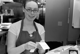 Lady taking our order at Herfy s burgers.jpg